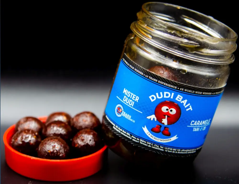 Reducere Boilies Solubil de Carlig Dudi Bait Mister Dudi Caramele, Squid&Cranberry, 100g