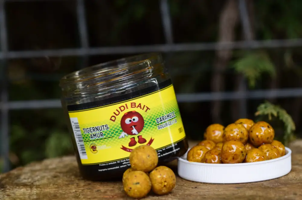 Promoție Boilies Solubil de Carlig Dudi Bait Tigernuts & Amur Caramele Solubile, 100g